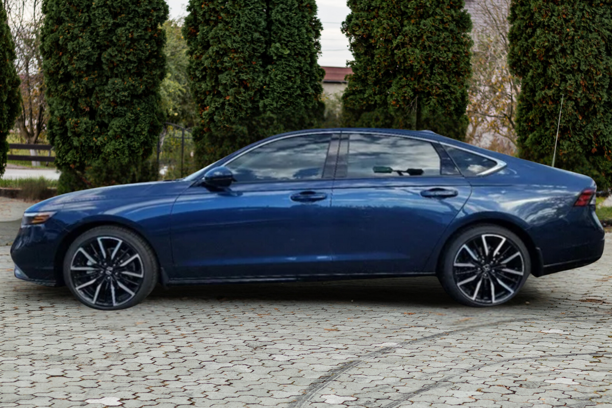 Side view of the 2025 Honda Accord Hybrid Touring trim in Canyon River Blue metallic color