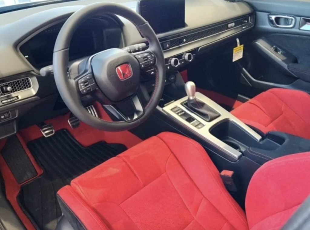 interior of a 2025 Honda Civic Type R with red and black details